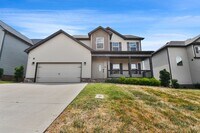 Building Photo - Pet Friendly Three Bedroom with Bonus!