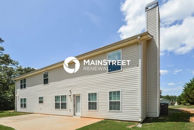 Building Photo - 4 Bedroom Pet-Friendly Home in Covington, GA with Main Street Renewal