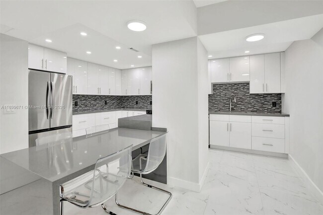 Building Photo - 9801 Collins Ave