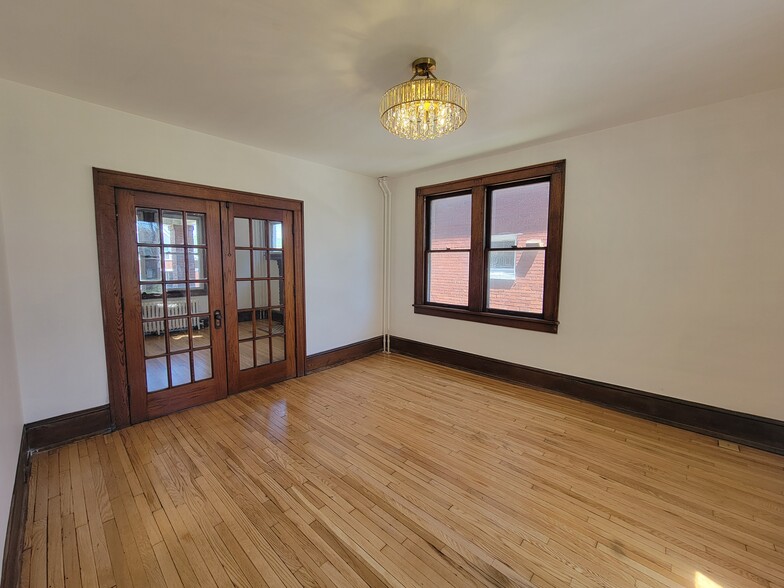 DINING ROOM WITH FRENCH DOORS - 632 Hill Top Dr