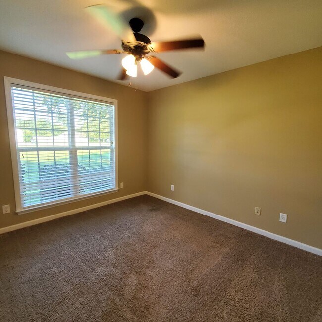 Building Photo - Welcome to Serene Living: Spacious Home on a .61 Acre Lot near Moody Airforce Base