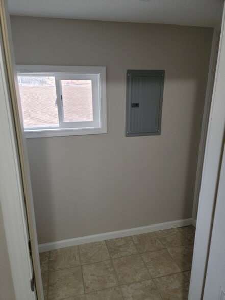 Storage/Back entry - 308 Lewis St S