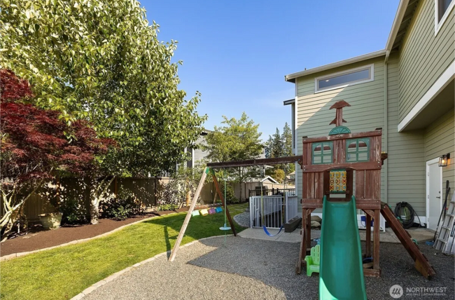 Building Photo - Spacious 4-Bedroom Gem with Fully Fenced Y...