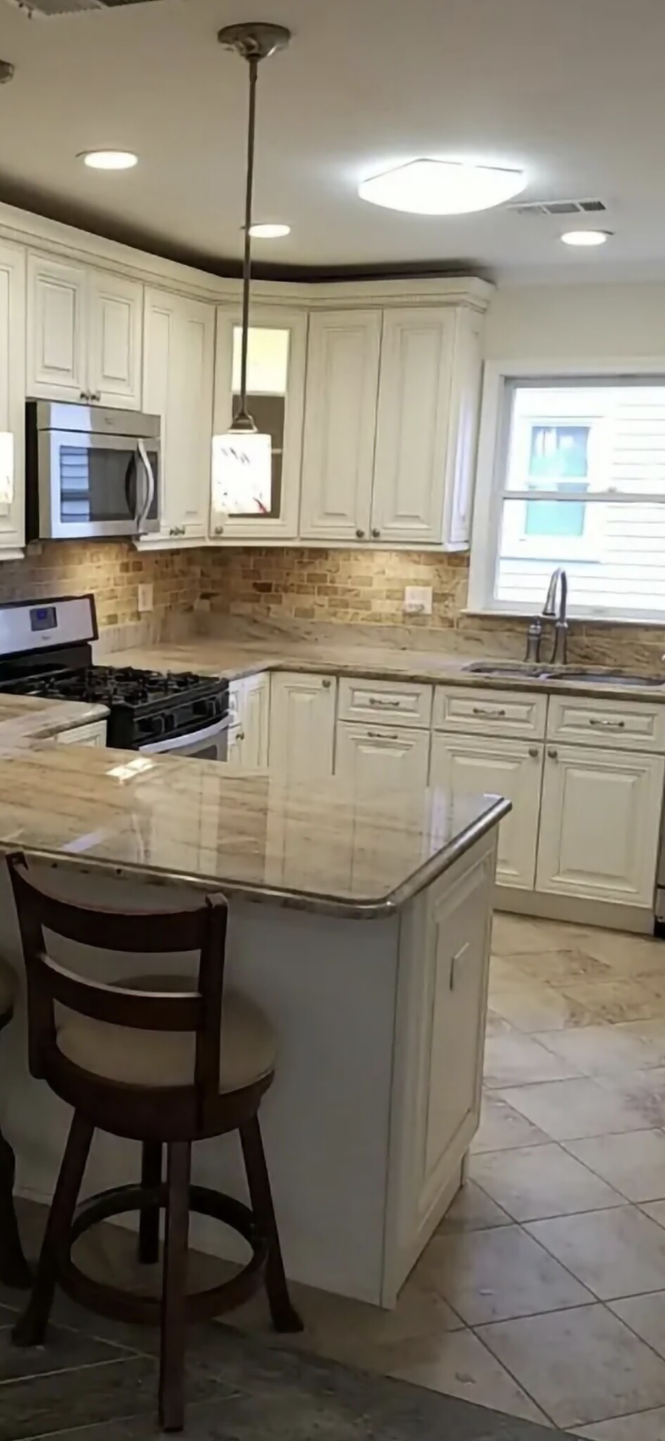 Open Space Kitchen with Adjoining Laundry Room - 18 Mallard Dr