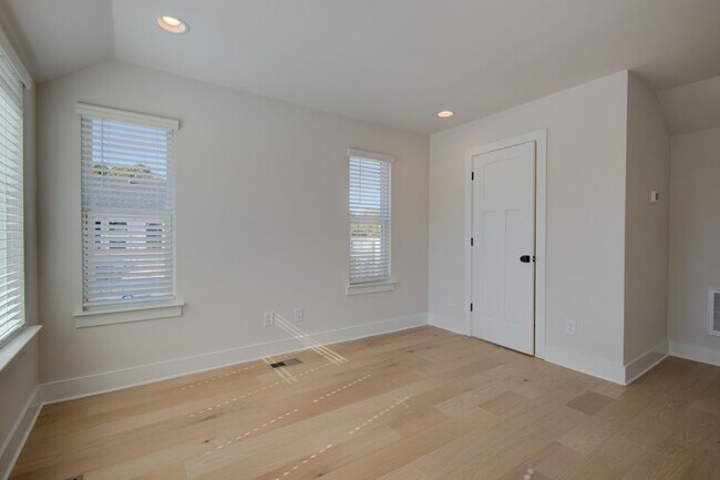 Building Photo - COMING SOON! Modern End-Unit Living Near Uptown | Rooftop Terrace + Tandem Garage