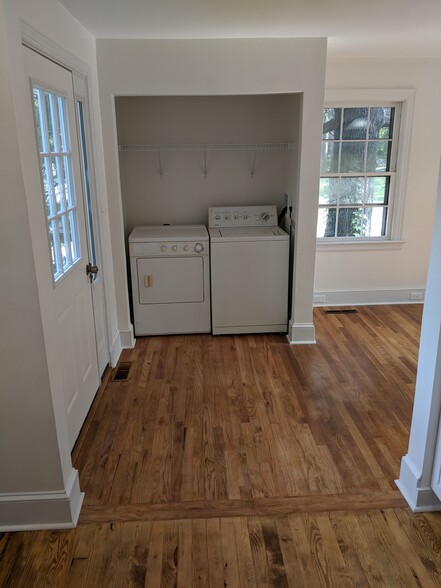 Laundry area and storage / back door to deck - 1111 Watauga St