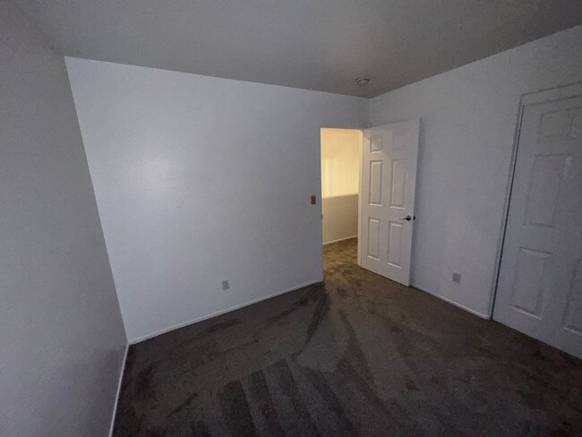 Building Photo - Fresh Paint/New Flooring all inside! Four ...