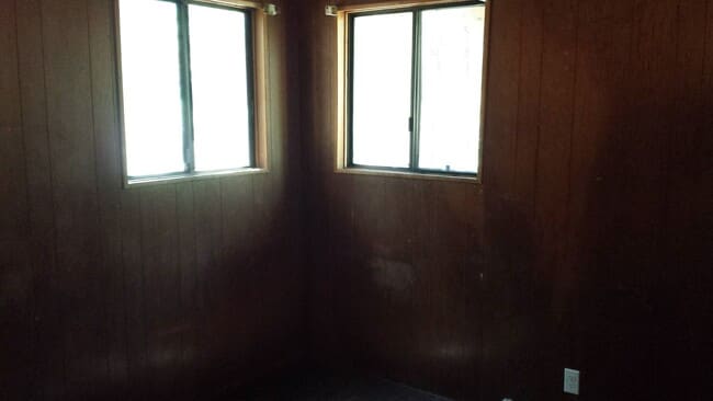 Building Photo - Rustic three bedroom with large lot.