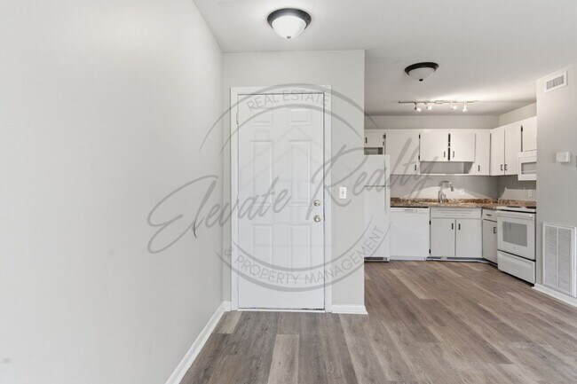 Building Photo - SPRING SPECIAL!! FIRST MONTH FREE on this ONE Bedroom Condo, First Floor, across from Madison Park!