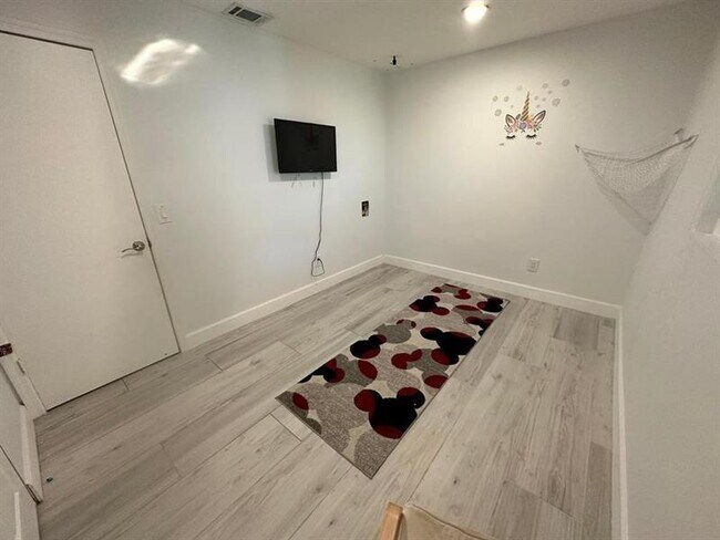 Building Photo - 8415 Red Wagon Ln