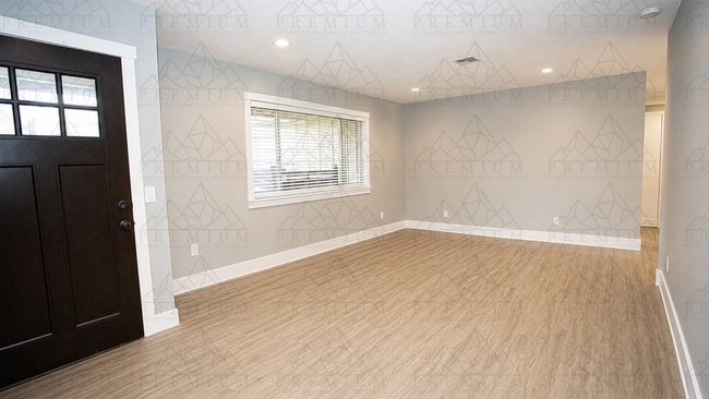 Building Photo - Renovated 3 bed 2 bath coming soon!