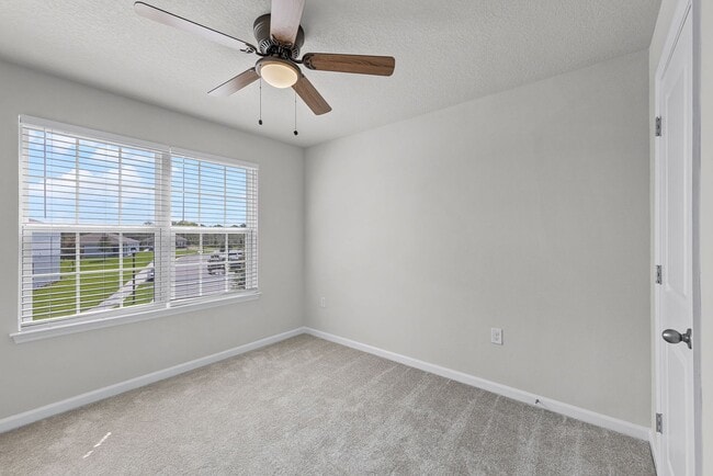 Building Photo - Brand-New 4BR Home with Tile Floors & Quartz Kitchen & Conservation Views