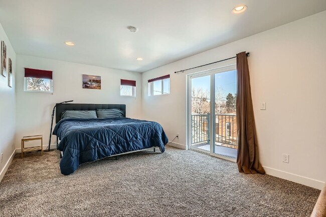 Building Photo - Available NOW! SIX MONTH LEASE - Spacious 3-Bedroom Townhouse with 3.5 Baths in Vibrant Sloans Lake!