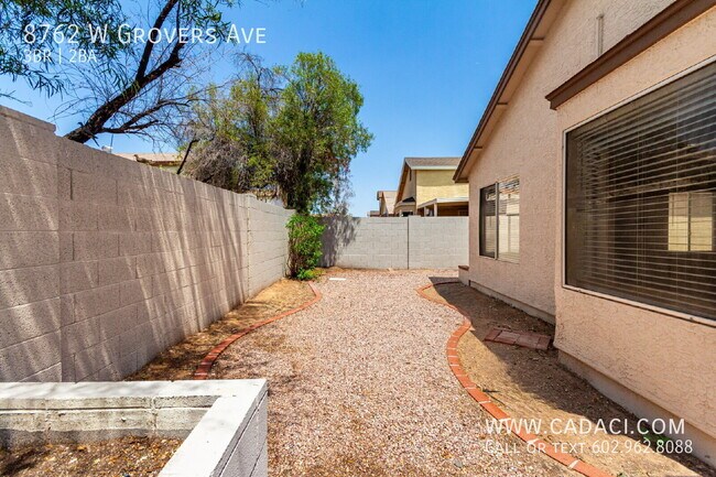 Building Photo - 8762 W Grovers Ave