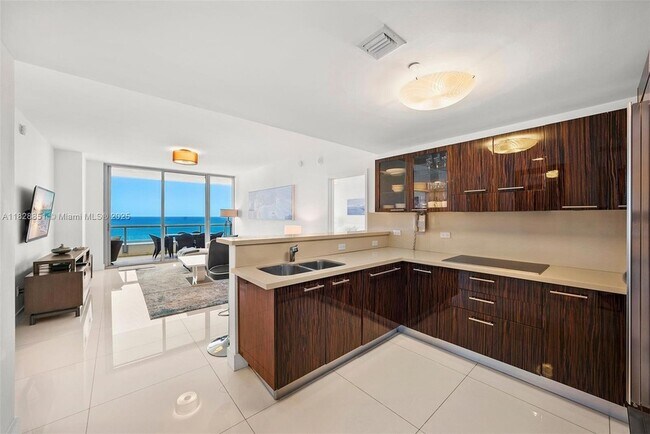 Building Photo - 6799 Collins Ave