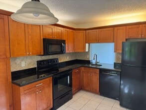 Building Photo - 3733 Carambola Cir N