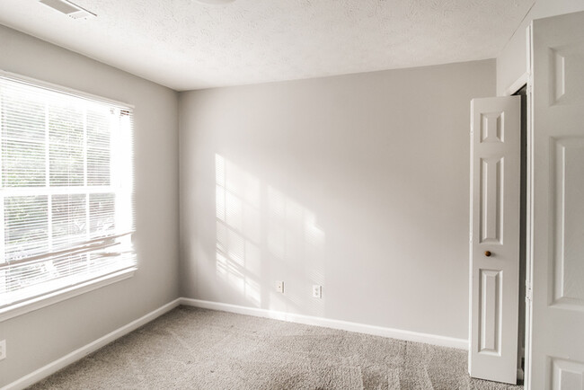 Building Photo - Home with Soaring Ceilings