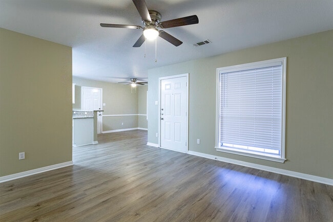 Dining & kitchen from living room - 1627 Rock Hollow Loop