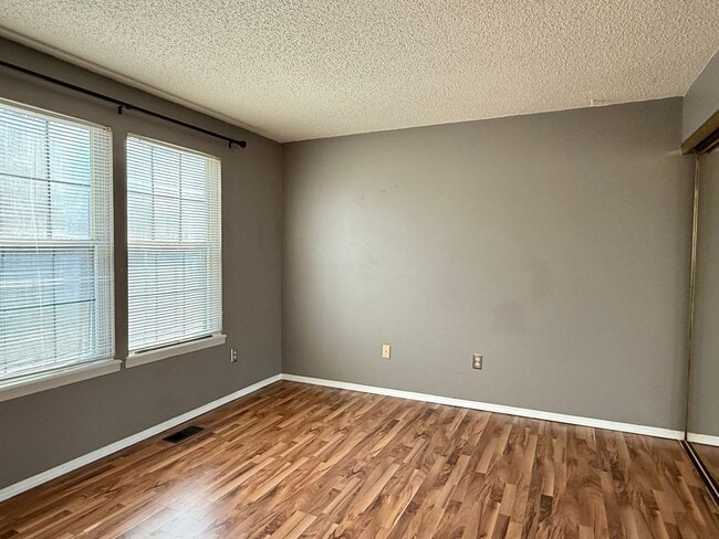 Building Photo - Open Tri-Level Townhome With Tons Of Space...