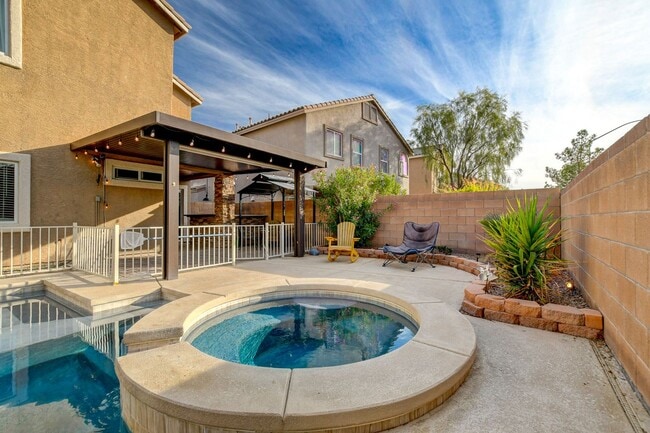 Building Photo - Pool Home with Downstairs Primary Bedroom!
