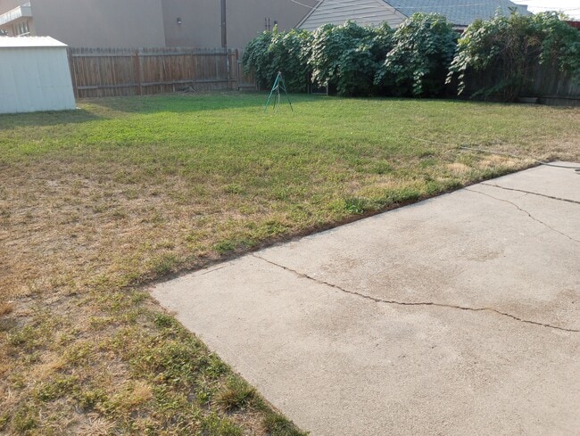 fenced rear yard - 1506 S Denver Ave