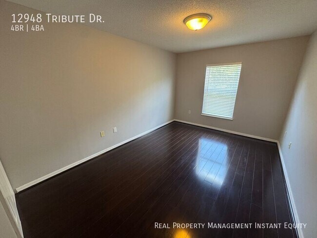 Building Photo - 12948 Tribute Dr