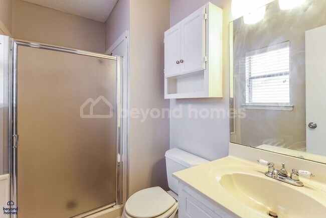 Building Photo - Move-In Ready Gem with Massive Fenced Yard & Private Deck!