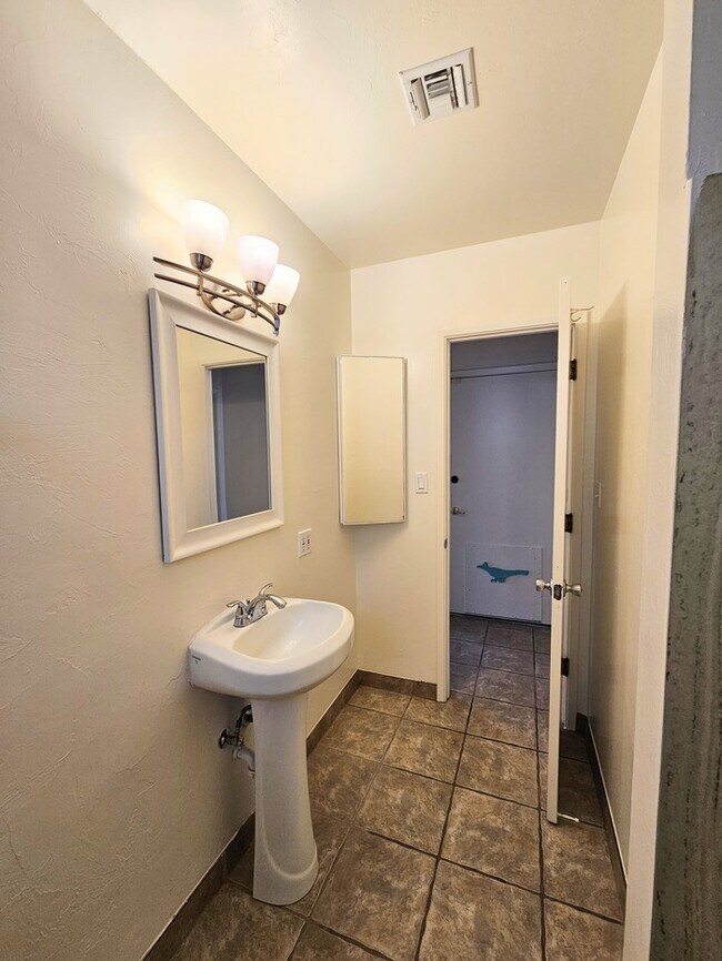 Building Photo - A charming 3-bedroom, 2-bathroom house in ...