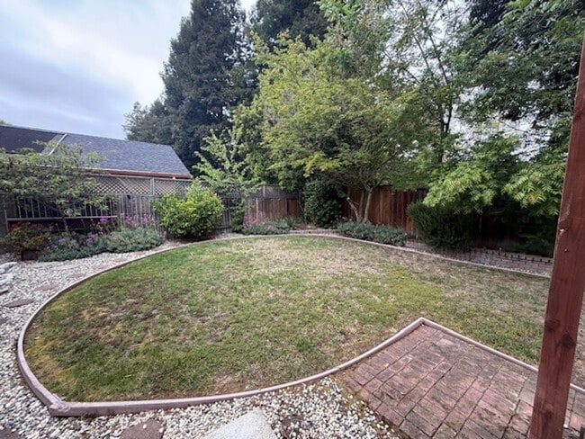 Building Photo - OPEN HOUSE this Wednesday 5pm-6:30pm - Private Redwood Setting | 4BR Home with Family Room, Bar &...