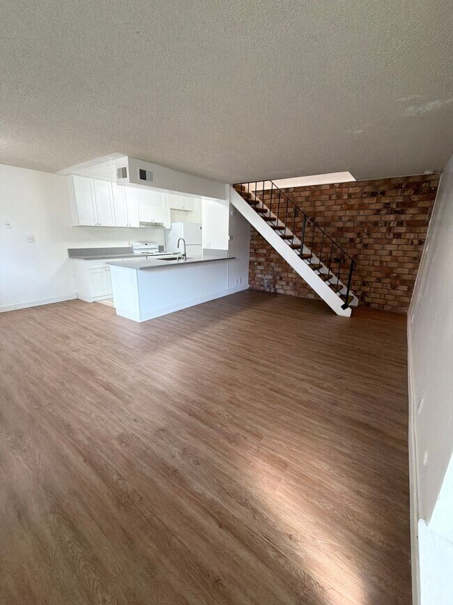 Building Photo - **MOVE-IN SPECIAL** 2-Story Condo With Lots of Character!