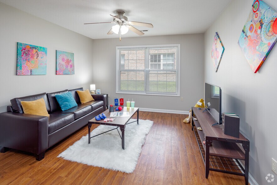 4BR, 2BA - Model - 1,200SF - Living Room - Eagle Village