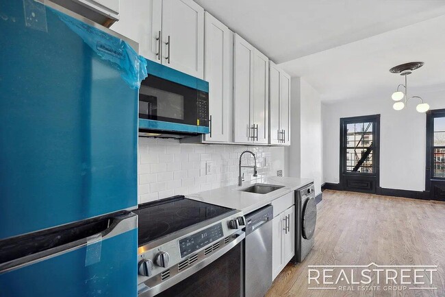 Building Photo - Timelessly Renovated Historic Triplex with...