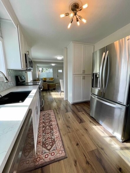 Kitchen with quartz countertops - 1215 E Adeline Ave