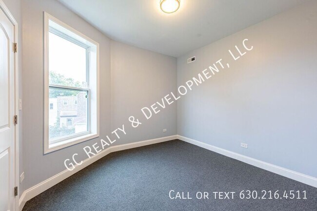 Building Photo - 6433 S Vernon Ave