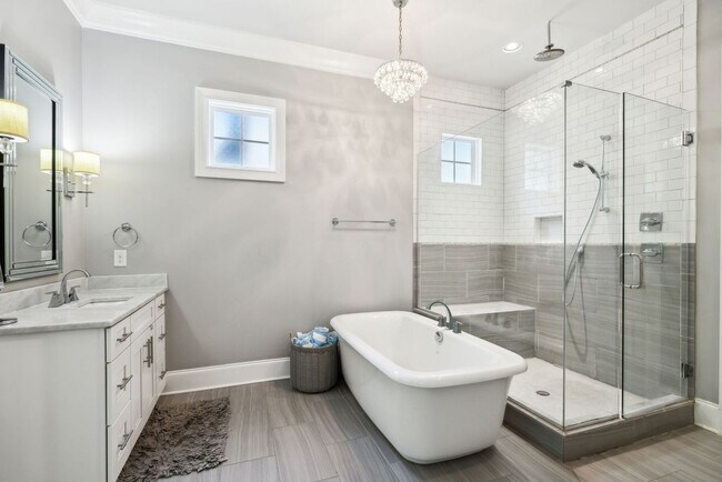 Building Photo - Welcome to this beautifully designed 4-bed...