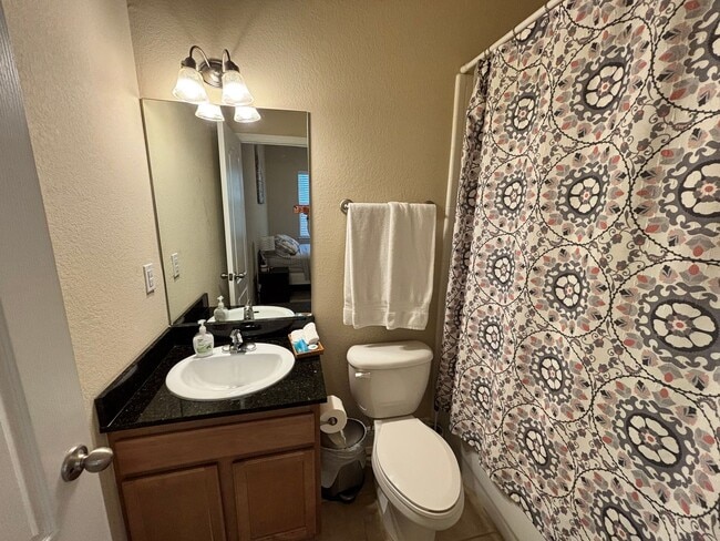 Building Photo - Fully Furnished 3-Bedroom Townhome