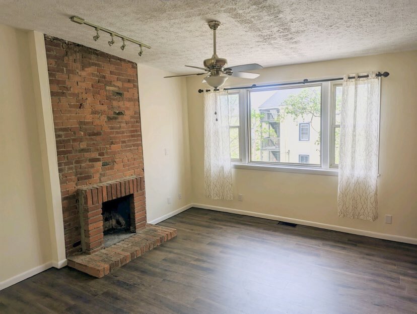 Open concept bedroom w/inoperable fireplace - 1619 Mansfield St