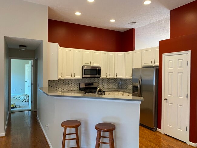 Kitchen overview hall to master - 709 Warmstone Ct