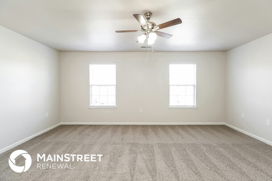 Building Photo - 6673 Thistle Down Dr