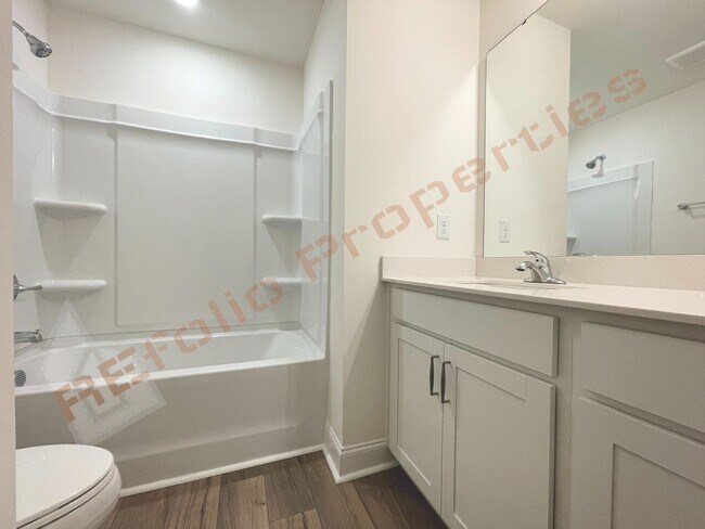 Building Photo - Modern Comfort Meets Peaceful Living—Stunning 3 Bedroom Townhome Near Downtown Raleigh Available ...