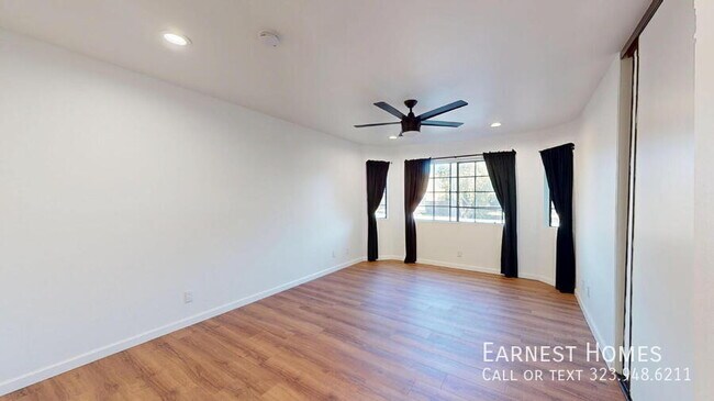 Building Photo - 10220 De Soto Ave