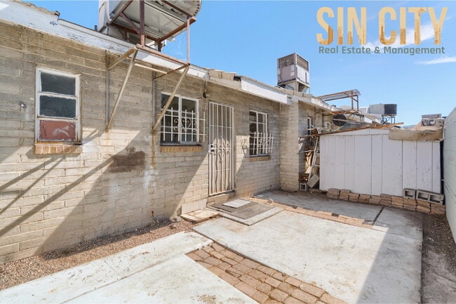 Building Photo - "Charming 1-Bed Duplex with Hardwood Elegance in Downtown Las Vegas!"