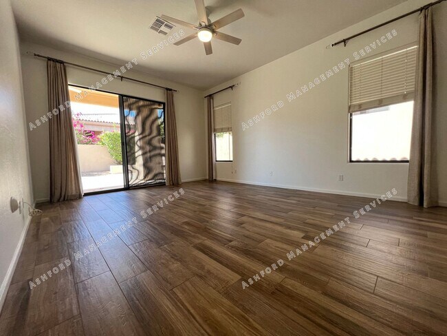 Building Photo - COME HOME TO LUXURY IN GATED GRAYHAWK GOLF...