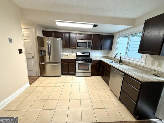 Building Photo - 1220 Kennesaw Trace Ct