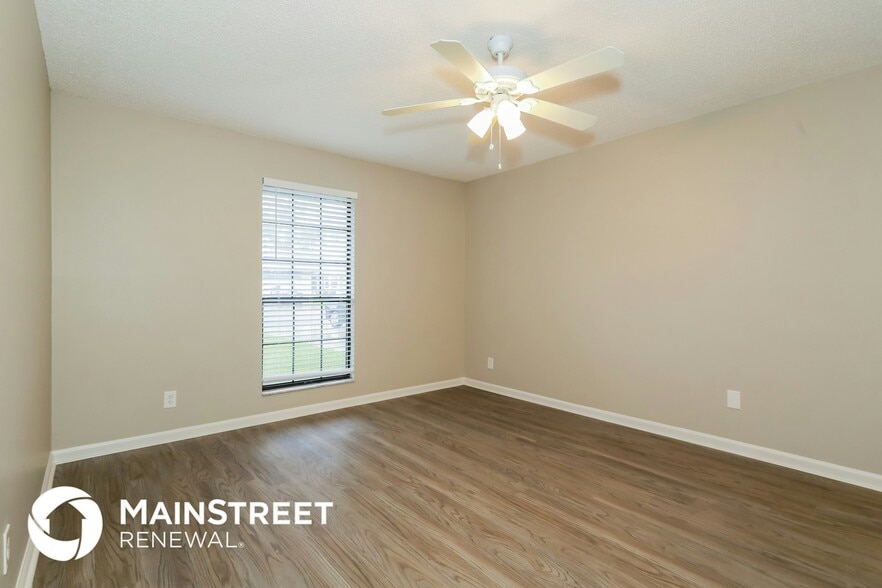 Building Photo - 6353 Tree Top Cir W
