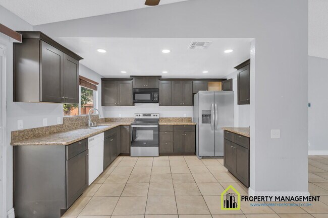 Building Photo - Remodeled 4-Bedroom Retreat with Large Backyard