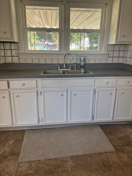 Lots of cabinet space. - 7209 Lucille Ave