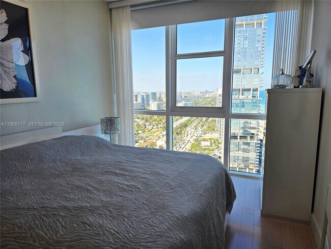 Building Photo - 18201 Collins Ave