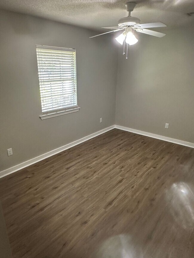 Building Photo - All New Flooring Throughout!
