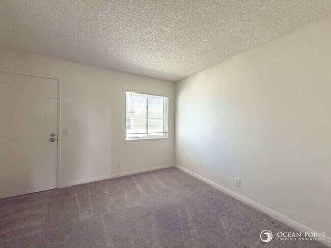 Building Photo - Charming 2 Bedroom Anacapa Condo just steps from the beach in Port Hueneme!